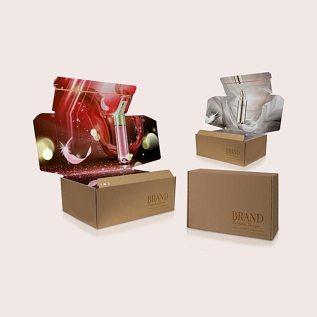 3 cardboard boxes with colourful internal printing