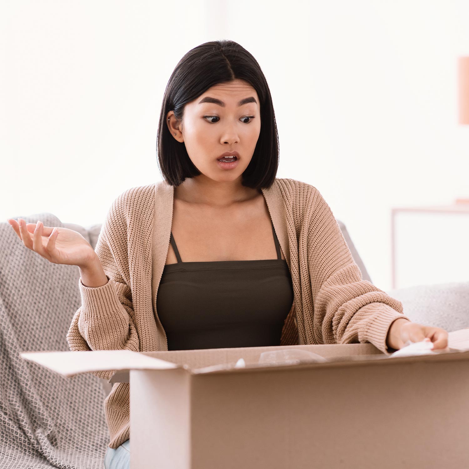 Annoyed woman unpacking