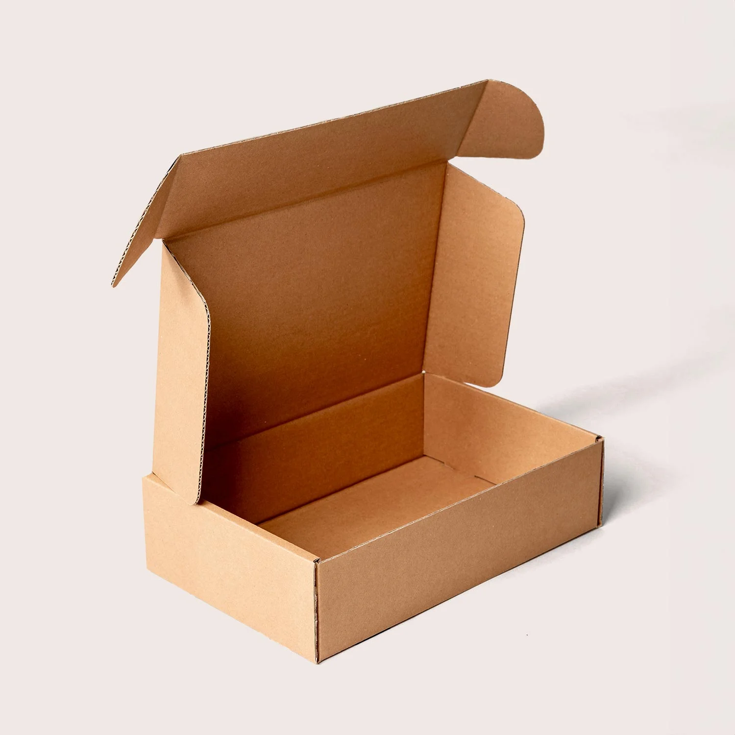 Folding box made from corrugated cardboard